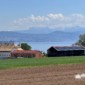 Toiture willy, ferblanterie avec tuiles et panneau solaire avec vue sur le lac et le paysage