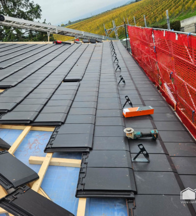 Reénovation de tuiles anthracite de la toiture