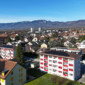 Rénovation énergétique d’immeuble à Gland avec toiture, cuivre et panneaux solaires