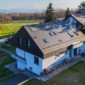 Rénovation d'une toiture à Genolier en Suisse