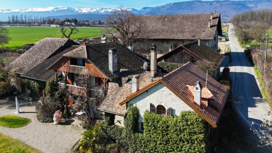 Toiture rénovée en cuivre et toiture à Coudre – Expertise Toiture Willy SA