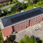 Nouvelle immeuble à Begins avec Impact Living et Toiture Willy SA