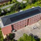 Nouvelle immeuble à Begins avec Impact Living et Toiture Willy SA